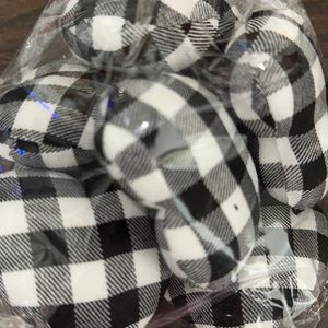 Buffalo plaid fabric heart decorations.